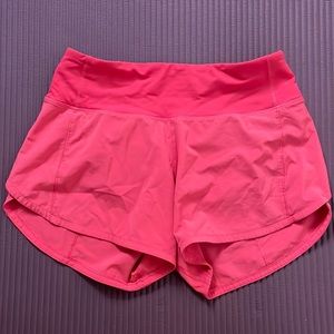 Lululemon Speed Mid-Rise 4 inch shorts in Rare Hot Pink